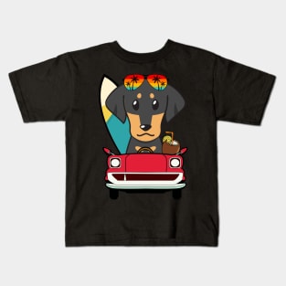 Surfer dachshund driving to the beach Kids T-Shirt